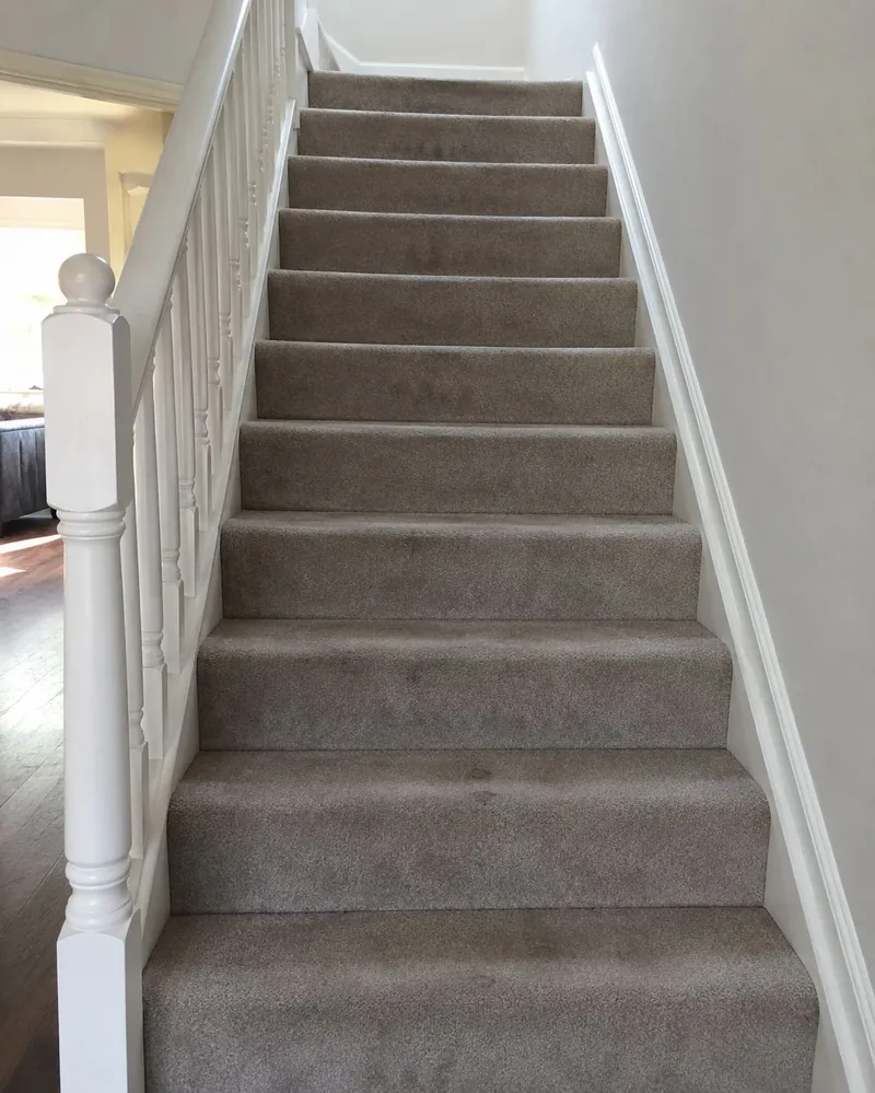 Worn carpet stairs