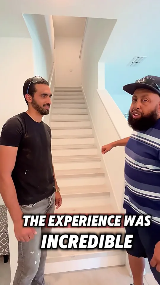 Naizie with Ayoub in front of his completed LVP staircase