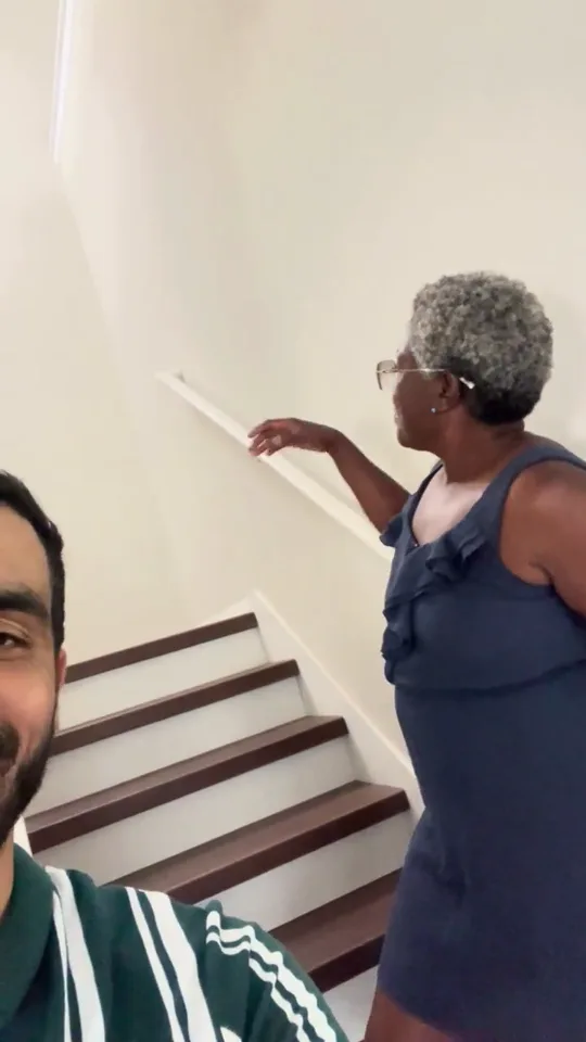 Patricia beside her completed LVP staircase